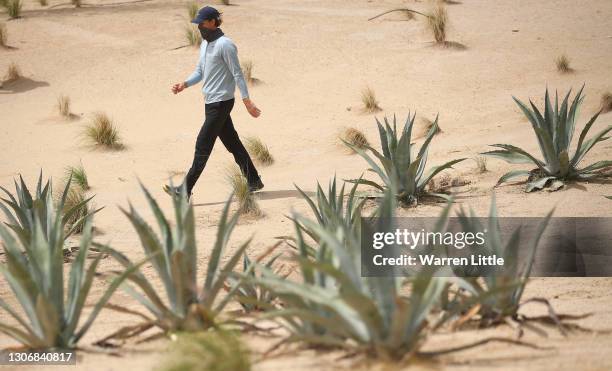 Thomas Pieters of Belgium walks to the seventh tee during the third round of the Commercial Bank Qatar Masters at Education City Golf Club on March...