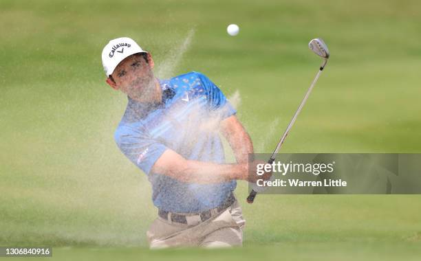 Fabrizio Zanotti of Paraguay plays out of the sixth greenside bunker during the third round of the Commercial Bank Qatar Masters at Education City...