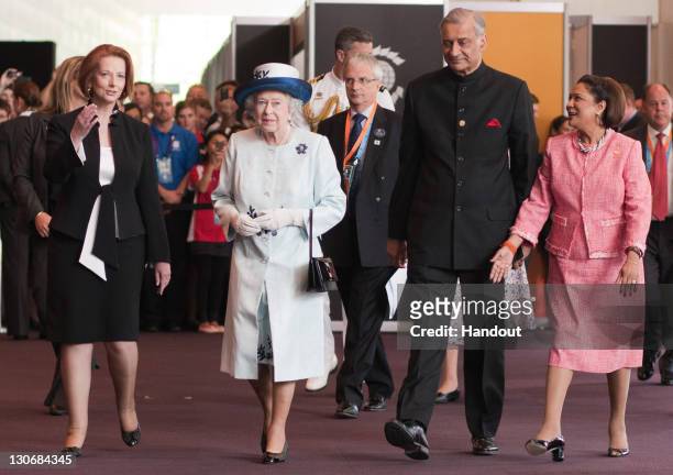 In this handout image provided by CHOGM, Australian Prime Minister Julia Gillard, Queen Elizabeth II, Commonwealth Secretary-General, His Excellency...