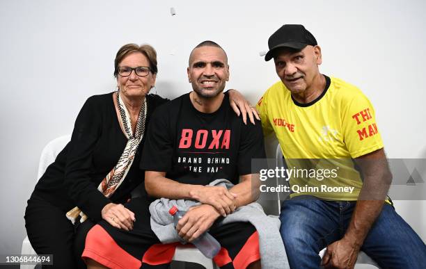 Anthony Mundine poses with his parents Lyn Mundine and Tony Mundine after fighting in the Anthony Mundine v Michael Zerafa fight at Bendigo Stadium...