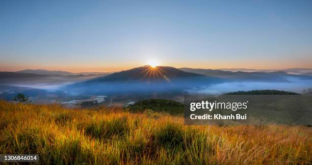 magic sunrise on the moutain peak - travel magazine cover stock pictures, royalty-free photos & images