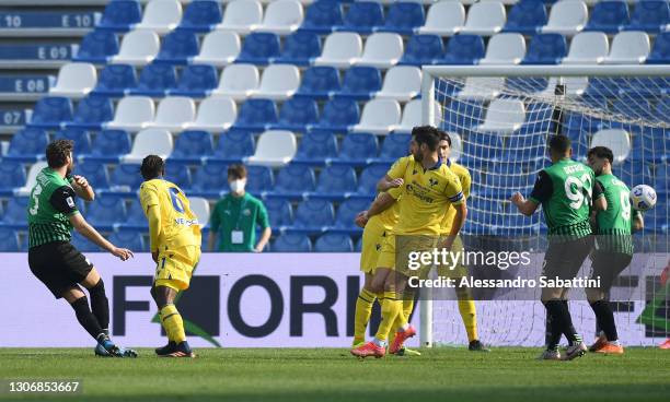 Manuel Locatelli of Sassuolo scores their team's first goal during the Serie A match between US Sassuolo and Hellas Verona FC at Mapei Stadium -...