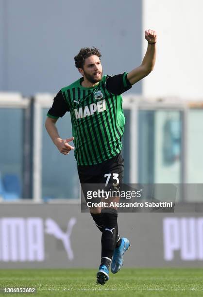 Manuel Locatelli of U.S. Sassuolo Calcio celebrates after scoring his team's first goal during the Serie A match between US Sassuolo and Hellas...