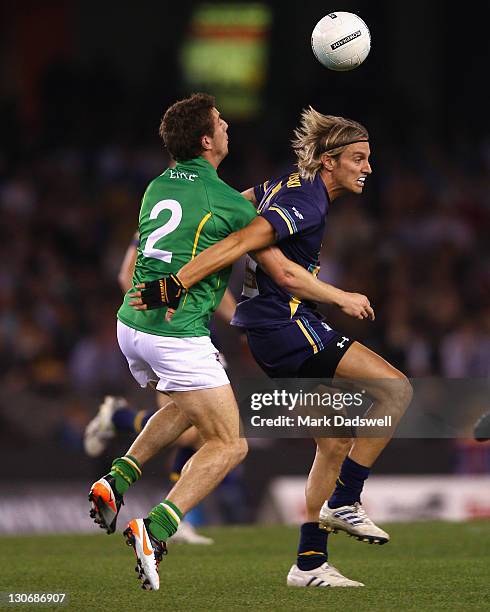 Colm Begley of Ireland competes with Mark Nicoski of Australia during game one of the International Rules Series between Australia and Ireland at...