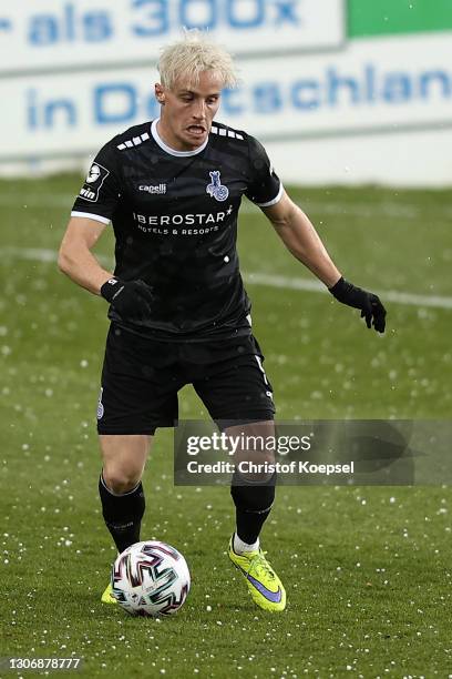 Mirnes Pepic of Duisburg runs with the ball during the 3. Liga match between Viktoria Köln and MSV Duisburg at Sportpark Hoehenberg on March 13, 2021...