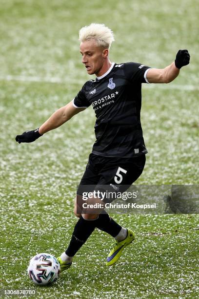 Mirnes Pepic of Duisburg runs with the ball during the 3. Liga match between Viktoria Köln and MSV Duisburg at Sportpark Hoehenberg on March 13, 2021...