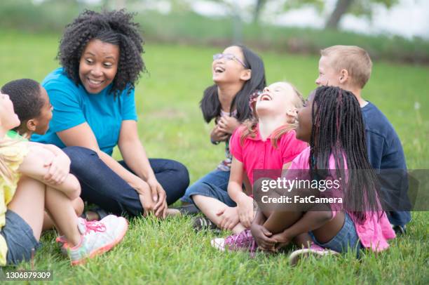 camp counselor and children at summer camp - summer school imagens e fotografias de stock