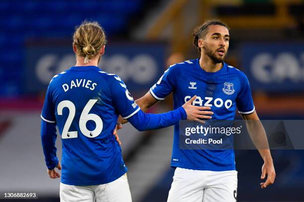 Dominic Calvert-Lewin of Everton celebrates after scoring their team's first goal with teammate Tom Davies during the Premier League match between...