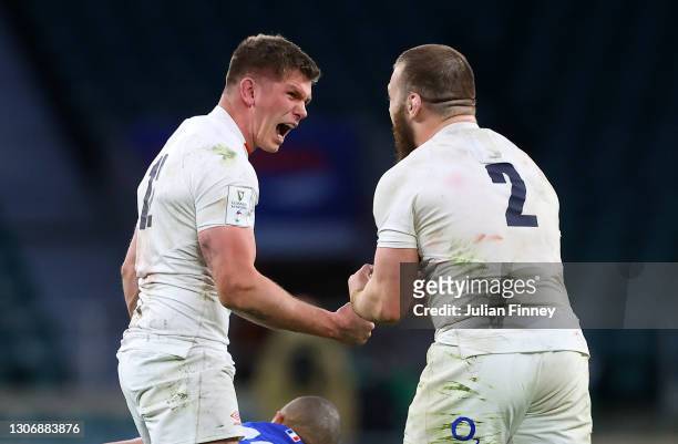 Owen Farrell of England celebrates with Luke Cowan-Dickie after a turnover during the Guinness Six Nations match between England and France at...