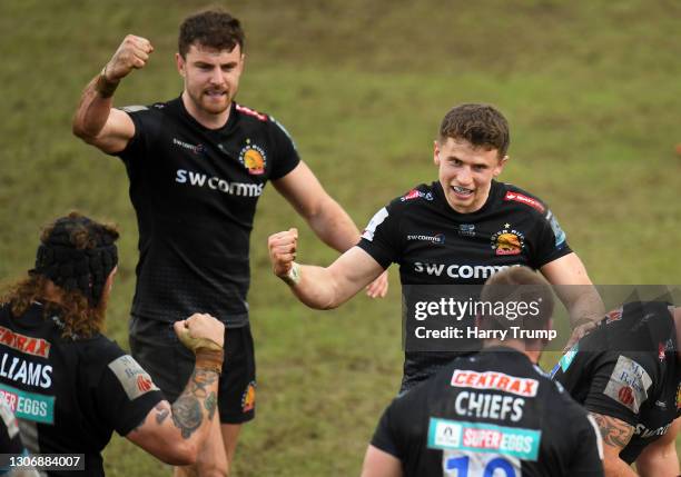 Harry Williams, Ollie Devoto and Harvey Skinner of Exeter Chiefs celebrate as Dave Ewers of Exeter Chiefs goes over to score their sides third try...