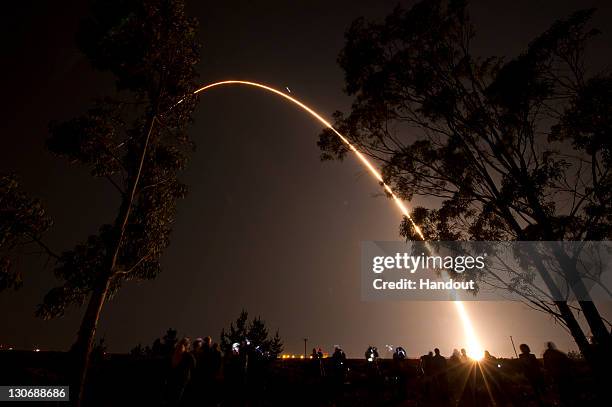 In this handout from NASA, A Delta II rocket launches with the NPOESS Preparatory Project spacecraft payload from Space Launch Complex 2 at...