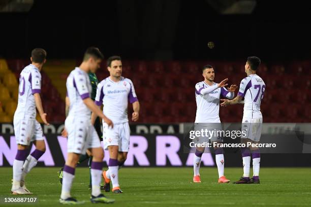 Valentin Eysseric of ACF Fiorentina celebrates with teammate Erick Pulgar after scoring his team's fourth goal during the Serie A match between...