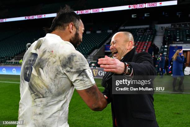 England Head Coach, Eddie Jones congratulates Billy Vunipola of England after victory in the Guinness Six Nations match between England and France at...