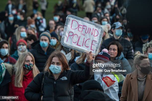 Thousands of people attend a vigil at Clapham Common bandstand to pay their respects and lay flowers in memory of Sarah Everard on March 13, 2021 in...