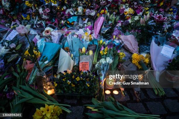 Thousands of people attend a vigil at Clapham Common bandstand to pay their respects and lay flowers in memory of Sarah Everard on March 13, 2021 in...