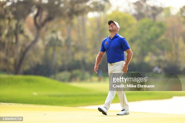 Lee Westwood of England reacts to a missed putt on the seventh green during the third round of THE PLAYERS Championship on THE PLAYERS Stadium Course...