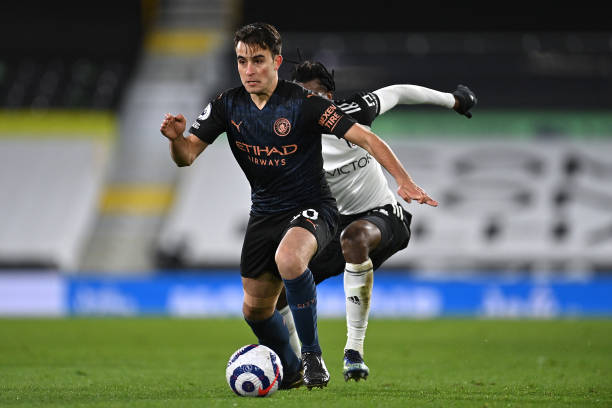 Eric Garcia of Manchester City battles for possession with Andre-Frank Zambo Anguissa of Fulham during the Premier League match between Fulham and...