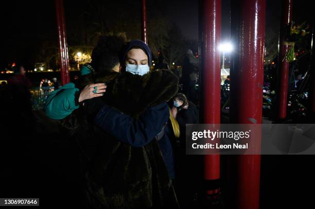 People attend a candle-lit vigil on Clapham Common in memory of Sarah Everard on March 13, 2021 in London, England. Vigils are being held across the...