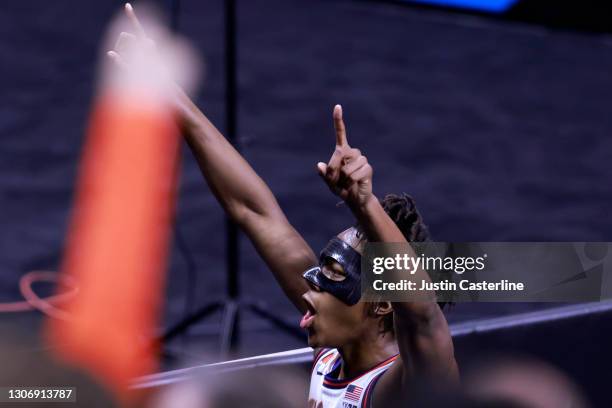 Ayo Dosunmu of the Illinois Fighting Illini points to the crowd as he walks off the court after a win over the Iowa Hawkeyes in the Big Ten men's...