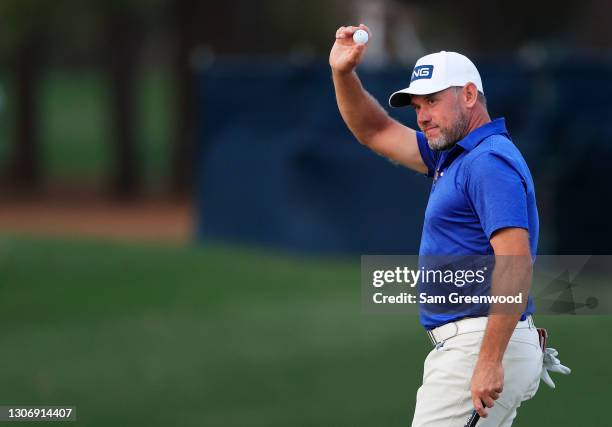 Lee Westwood of England reacts to his birdie on the 17th green during the third round of THE PLAYERS Championship on THE PLAYERS Stadium Course at...