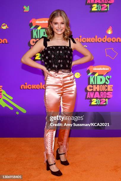 In this image released on March 13, Darci Lynne Farmer attends Nickelodeon's Kids' Choice Awards at Barker Hangar on March 13, 2021 in Santa Monica,...