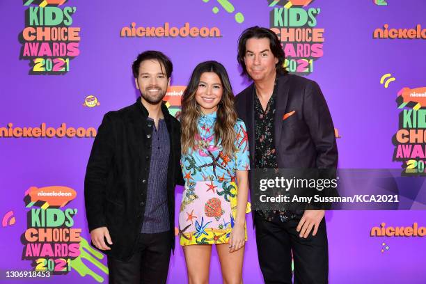 In this image released on March 13, Nathan Kress, Miranda Cosgrove and Jerry Trainor attend Nickelodeon's Kids' Choice Awards at Barker Hangar on...
