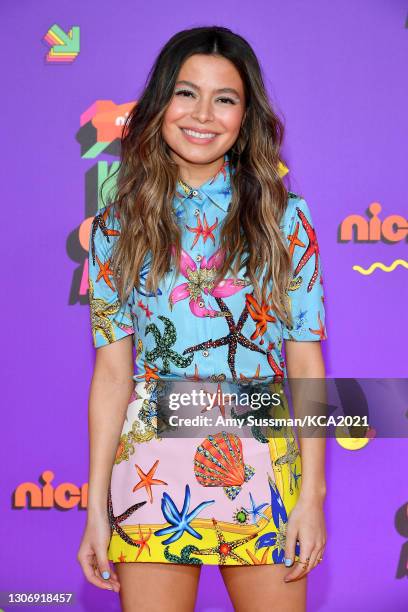 In this image released on March 13, Miranda Cosgrove attends Nickelodeon's Kids' Choice Awards at Barker Hangar on March 13, 2021 in Santa Monica,...