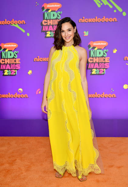 In this image released on March 13, Gal Gadot attends Nickelodeon's Kids' Choice Awards at Barker Hangar on March 13, 2021 in Santa Monica,...