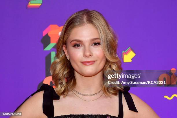 In this image released on March 13, Darci Lynne Farmer attends Nickelodeon's Kids' Choice Awards at Barker Hangar on March 13, 2021 in Santa Monica,...