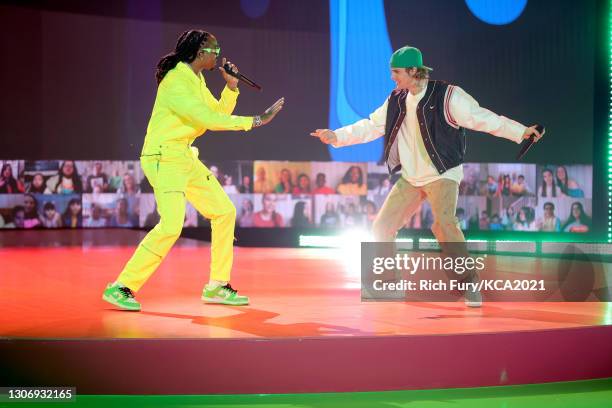 In this image released on March 13, Quavo and Justin Bieber perform onstage during Nickelodeon's Kids' Choice Awards at Barker Hangar on March 13,...