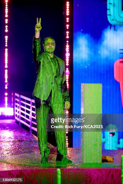 In this image released on March 13, Robert Downey Jr. Speaks onstage during Nickelodeon's Kids' Choice Awards at Barker Hangar on March 13, 2021 in...