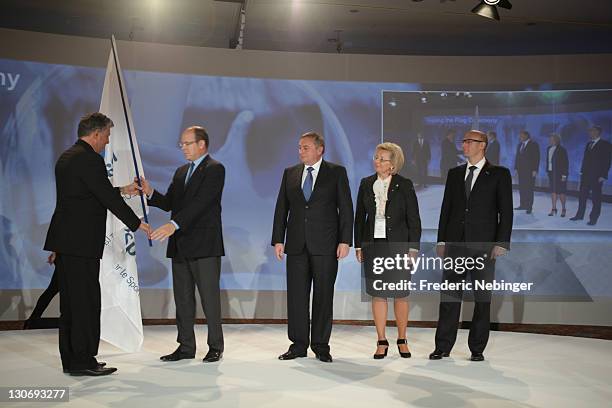 Joel Bouzou, HRH Prince Albert II of Monaco, Dimitri Pachomov, Nataliy Parshikova and Dimitry Chernishenko pose for pictures during the flag ceremony...