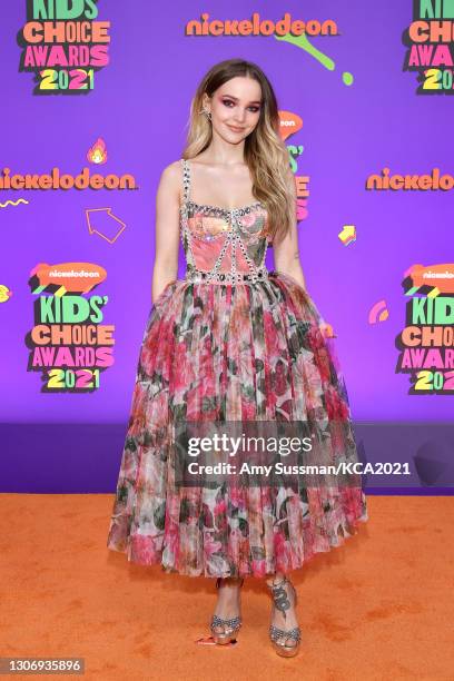 In this image released on March 13, Dove Cameron attends Nickelodeon's Kids' Choice Awards at Barker Hangar on March 13, 2021 in Santa Monica,...