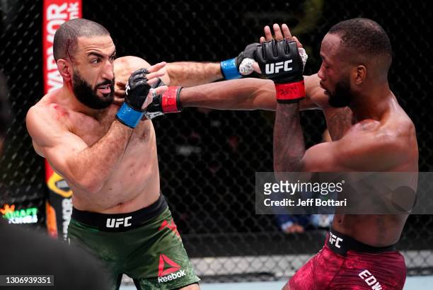 Leon Edwards of Jamaica battles Bulal Muhammad in a welterweight fight during the UFC Fight Night event at UFC APEX on March 13, 2021 in Las Vegas,...