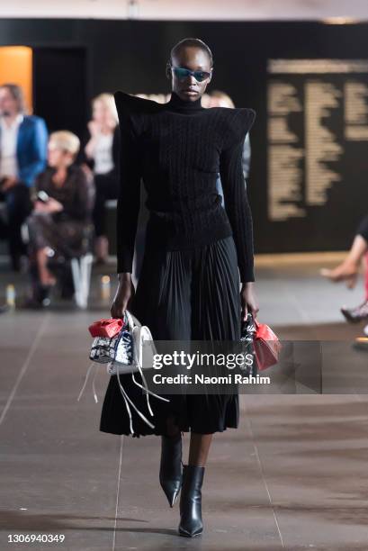 Model showcases designs by Balenciaga during the Gala Runway at Melbourne Fashion Festival at National Gallery of Victoria on March 11, 2021 in...