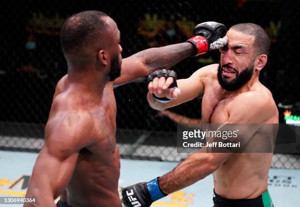 Leon Edwards of Jamaica accidentally pokes the eye of Bulal Muhammad in a welterweight fight during the UFC Fight Night event at UFC APEX on March...