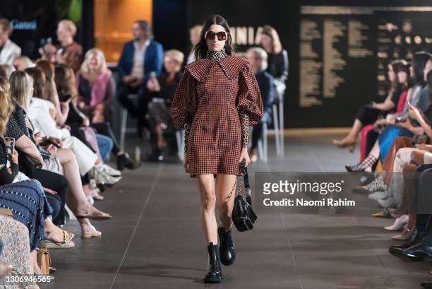 Olympia Christou showcases designs by Ganni during the Gala Runway at Melbourne Fashion Festival at National Gallery of Victoria on March 11, 2021 in...