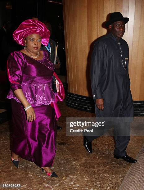 Nigeria's President Goodluck Jonathan right, and wife Patience arrive for a banquet attended by Queen Elizabeth II during the Commonwealth Heads Of...