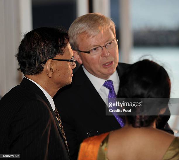 Australia's Foreign Minister Kevin Rudd speaks with Sri lanka's Foreign Minister Gamini Lakshman Peiris at a Commonwealth Foreign Ministers'...