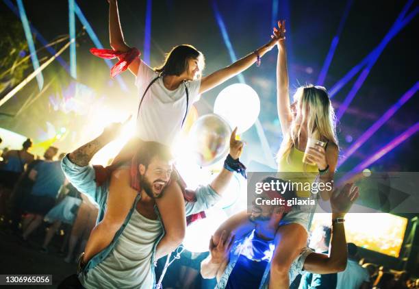 Shoulder Rides Concert 516 Riding On Shoulders Concert Stock Photos, High-Res Pictures, and ...