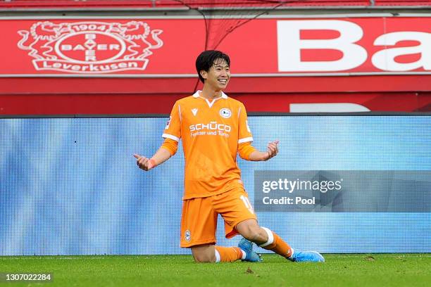 Masaya Okugawa of DSC Arminia Bielefeld celebrates after scoring their side's second goal during the Bundesliga match between Bayer 04 Leverkusen and...