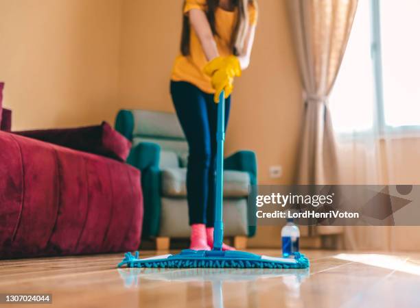 woman cleaning the house - hardwood stock pictures, royalty-free photos & images