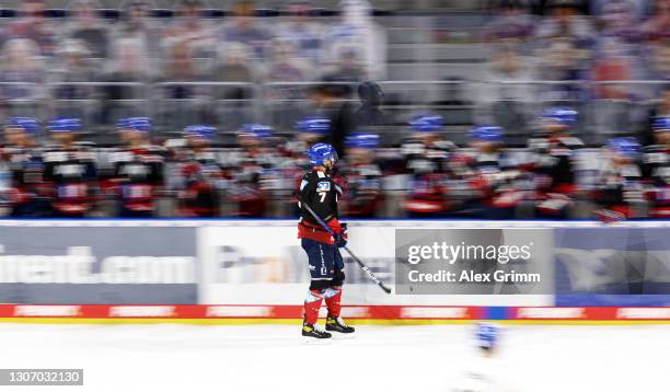 Sinan Akdag of Mannheim celebrates his team's fourth goal with teammates during the Penny DEL match between Adler Mannheim and Augsburger Panther at...