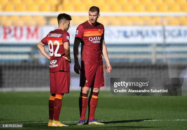 Edin Dzeko of Roma looks on with team mate Stephan El Shaarawy during the Serie A match between Parma Calcio and AS Roma at Stadio Ennio Tardini on...