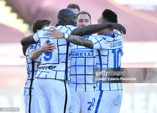 Romelu Lukaku of Internazionale celebrates with team mates Christian Eriksen and Lautaro Martinez after scoring their side's first goal from the...