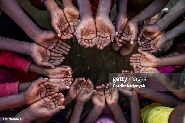 hands of poor - asking for help, africa - hungry poor child stock pictures, royalty-free photos & images
