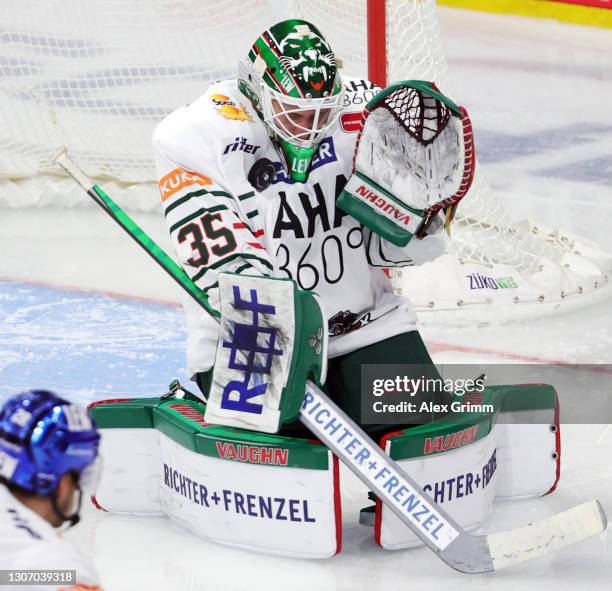 Goalkeeper Markus Keller of Augsburg makes a save during the Penny DEL match between Adler Mannheim and Augsburger Panther at SAP Arena on March 14,...