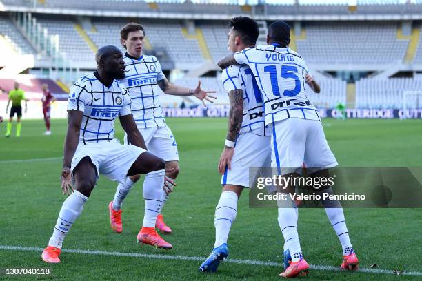 Lautaro Martinez of Internazionale celebrates with team mates Romelu Lukaku, Nicolo Barella and Ashley Young after scoring their side's second goal...