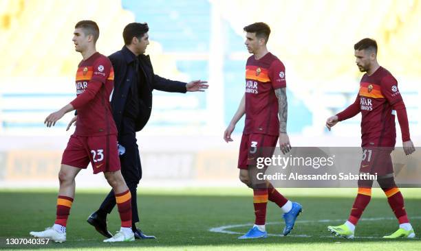 Paulo Fonseca, Head Coach of A.S Roma interacts with Roger Ibanez of A.S Roma after the Serie A match between Parma Calcio and AS Roma at Stadio...
