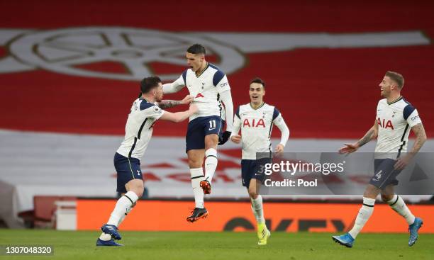 Erik Lamela of Tottenham Hotspur celebrates with team mates Pierre-Emile Hojbjerg, Sergio Reguilon and Toby Alderweireld after scoring their side's...